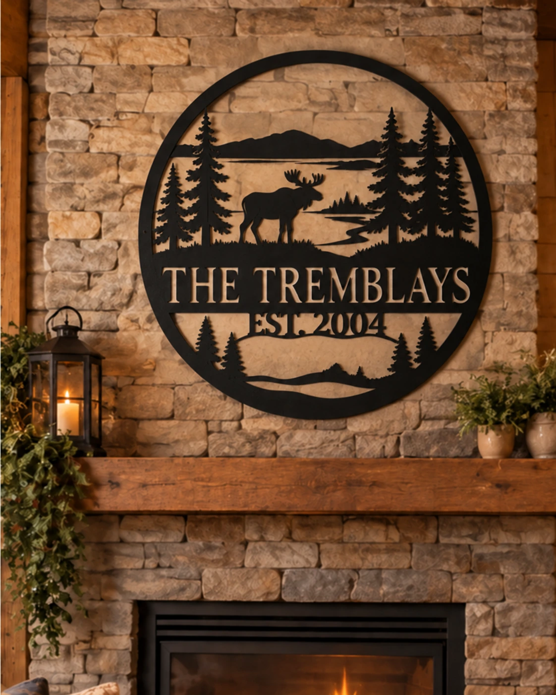 The Tremblays custom metal sign above a warm fireplace