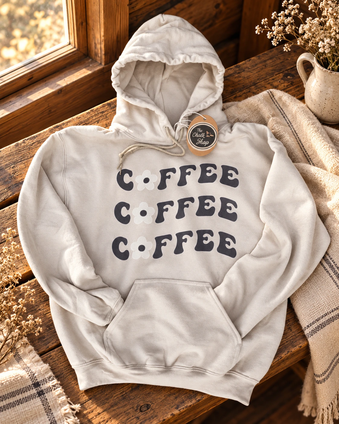 Coffee coffee coffee hoodie or T-Shirt displayed in a warm styled setting
