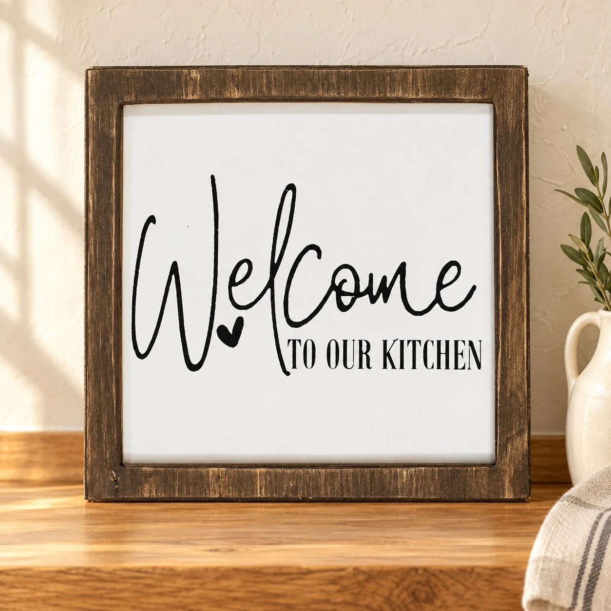 Welcome to Our Kitchen in a warm styled setting