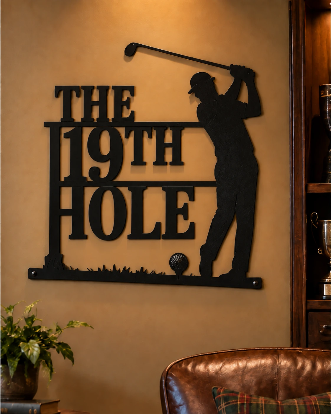 The 19th Hole metal golf sign in a warm clubhouse setting